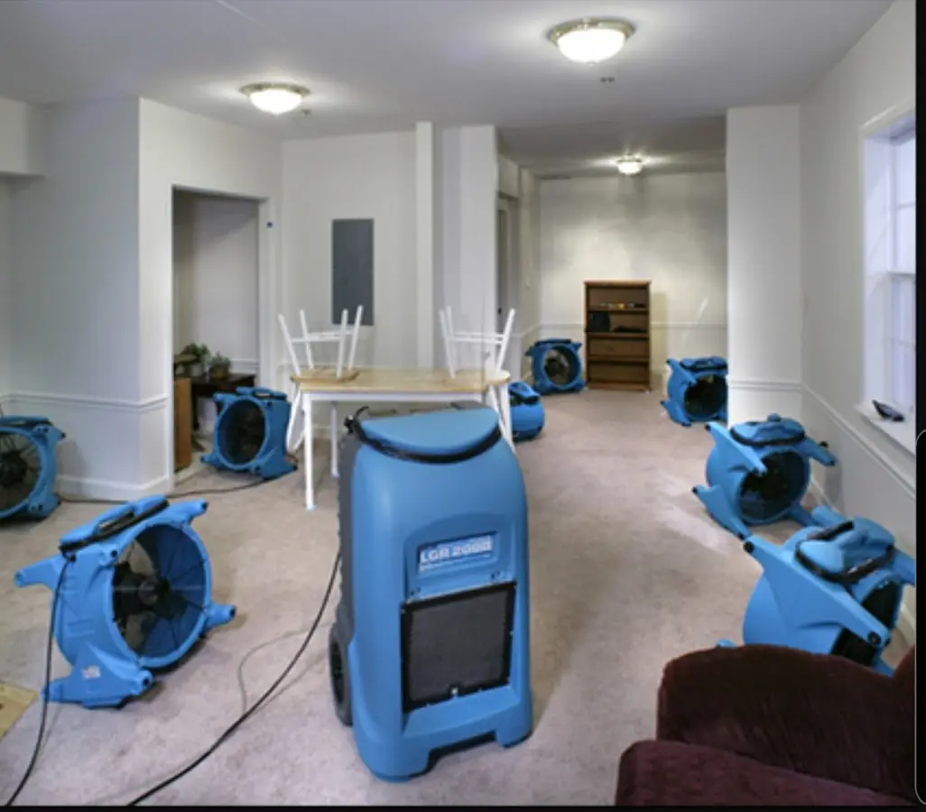 Air movers and dehumidifier setup for Water Damage Restoration in Lovington